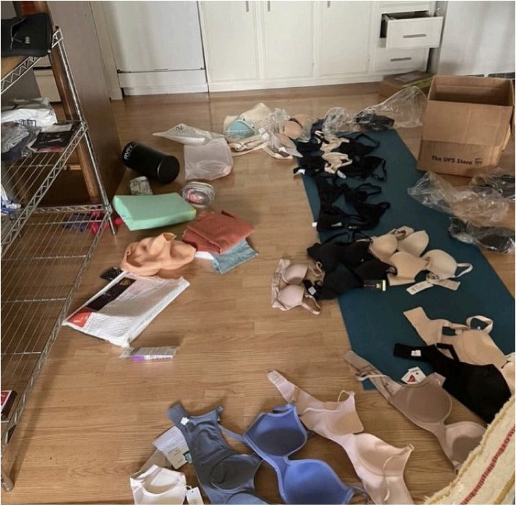 A pile of over 50 bras that didn't fit