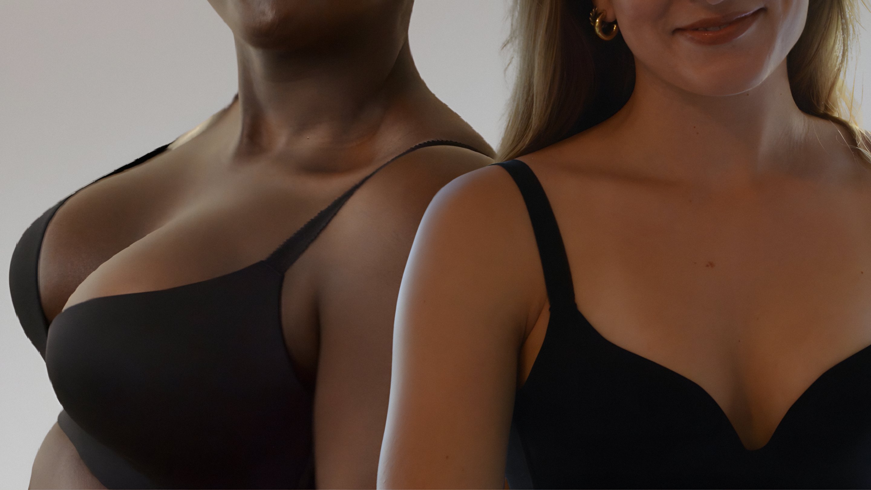 People wearing The Radical Bra in black